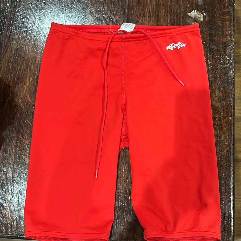 Dolfin red swimming trunks. Youth size 30. In GUC.